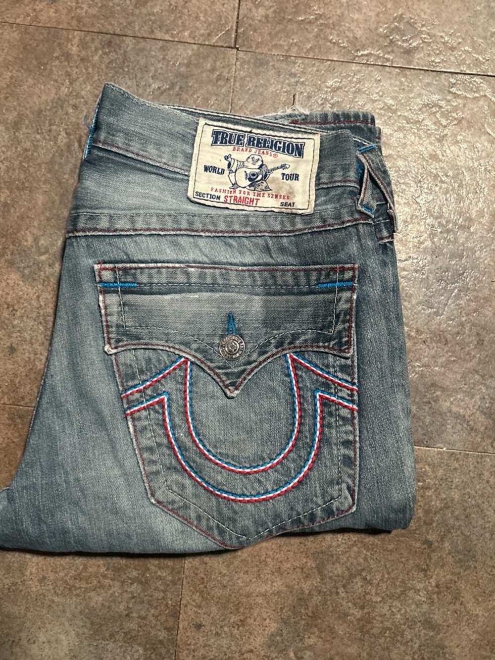 True Religion Men’s Faded Blue Straight Jeans with Contrasting Stitch